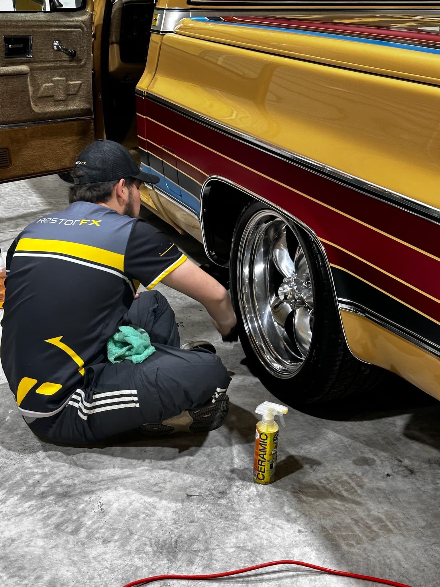 Painted brake calipers — bold color visible through wheel spokes
