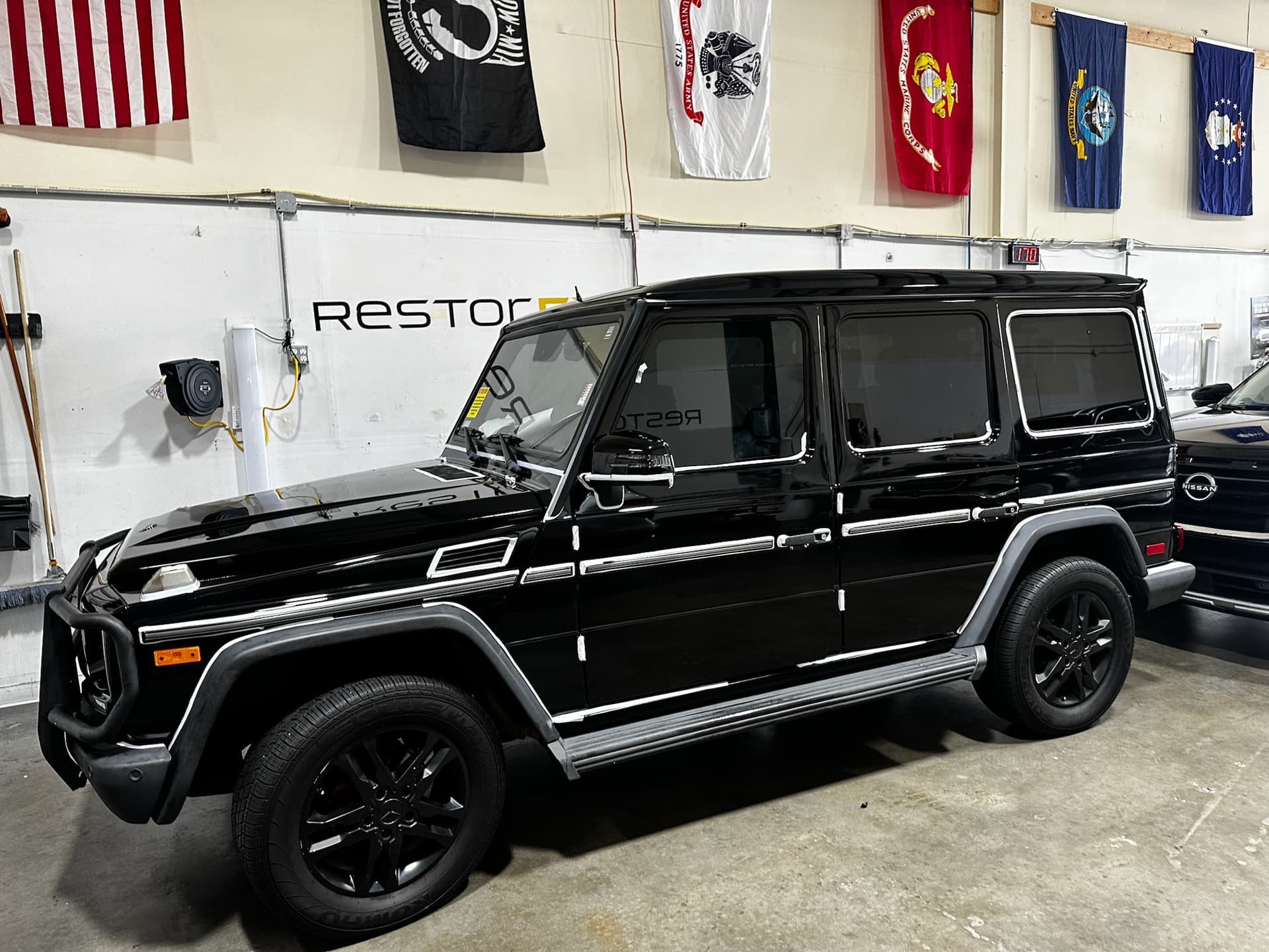 Black SUV inside the KAR FX Customs workshop